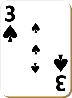 A Card With A Number Of Spades