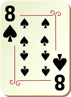 A Playing Card With A Number Of Spades