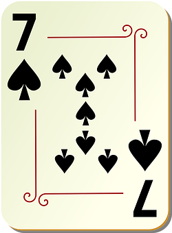 A Playing Card With Seven Of Spades