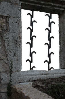 Ancient Stone Windowwith Iron Bars PNG with transparent background