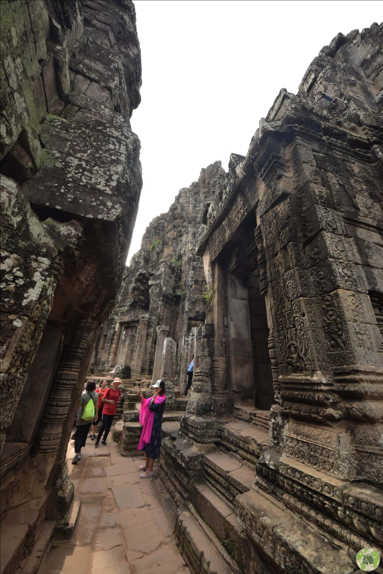 Ancient_ Temple_ Corridor_with_ Visitors.jpg