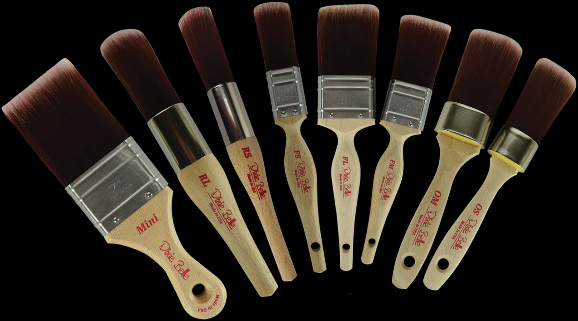 Assorted_ Paintbrushes_on_ Black_ Background.jpg