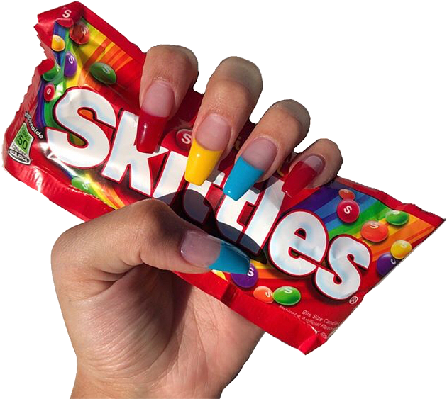 Colorful Nails Holding Skittles Package