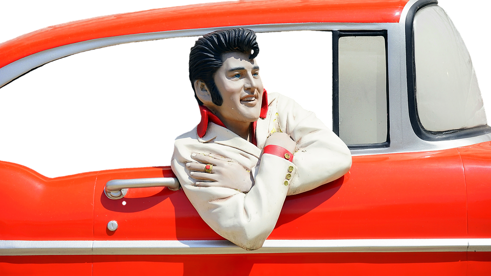 Elvis Presley Figurein Classic Car PNG with transparent background