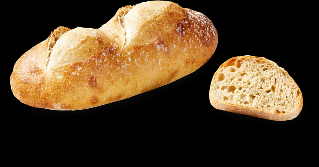 Fresh Baked Baguetteand Sliceon Black Background