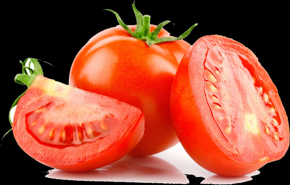 Fresh Tomatoand Sliceson Black Background