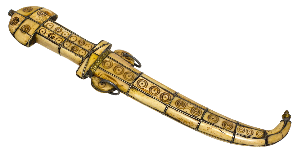 Golden Ceremonial Dagger Artifact PNG with transparent background