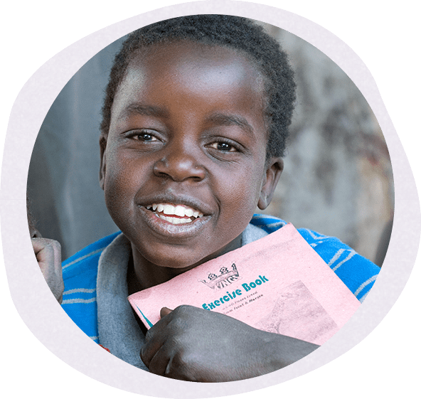 Happy Child With Exercise Book