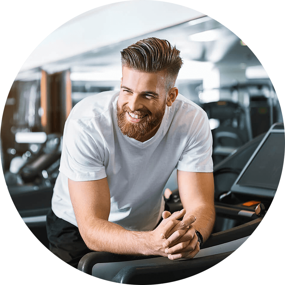 Happy Man Exercisingon Treadmill