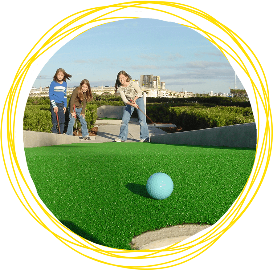 Kids Playing Mini Golf Outdoors