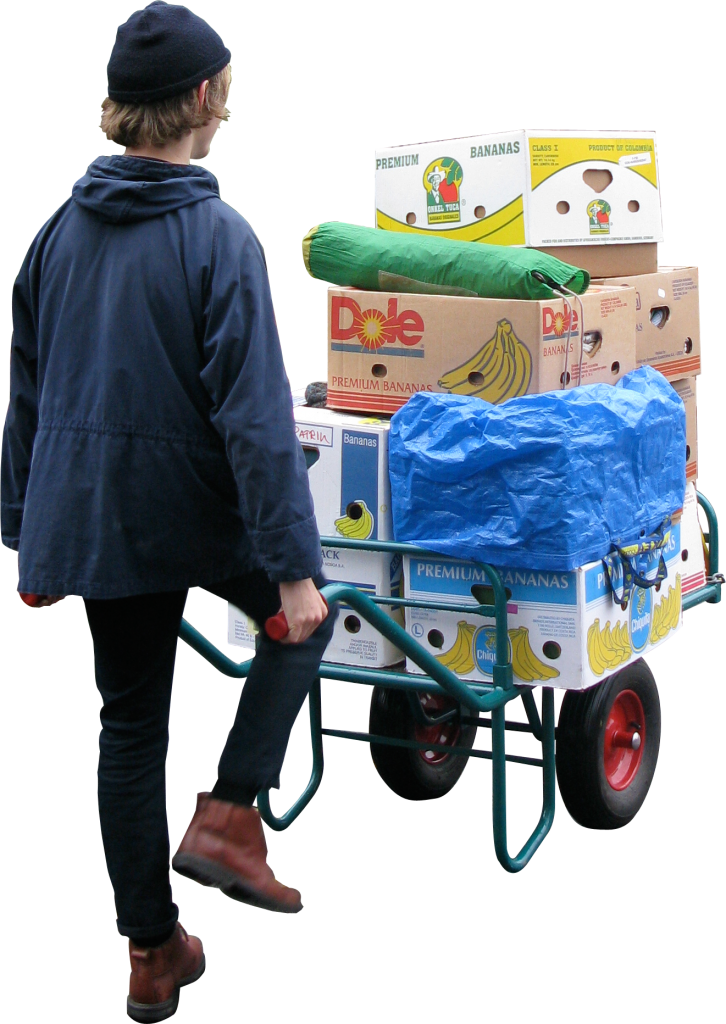 Man Pushing Loaded Wheelbarrow