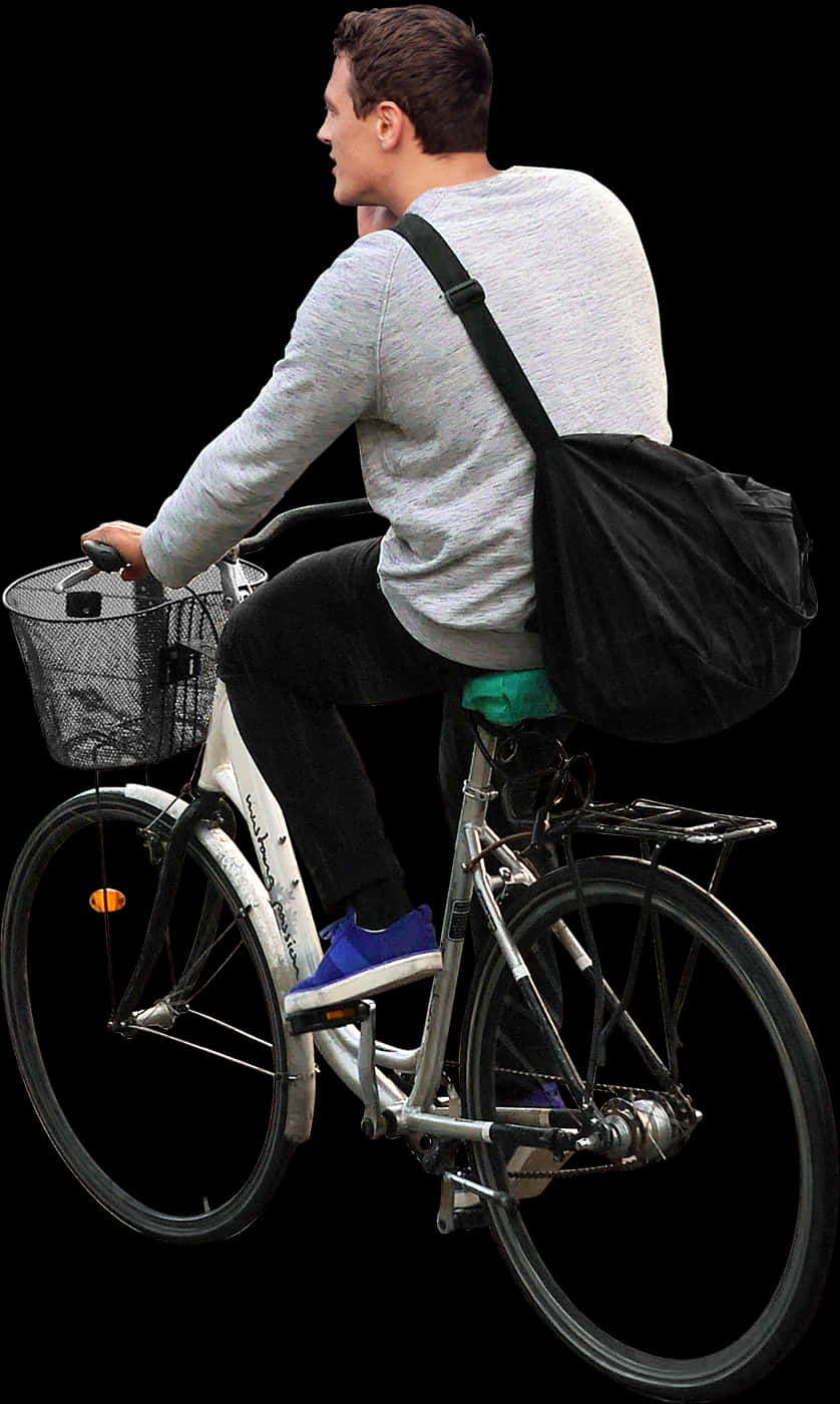 Man Riding Bicycle With Basketand Bag