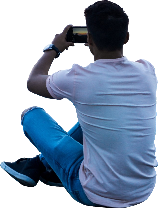 Man Sitting Using Smartphone