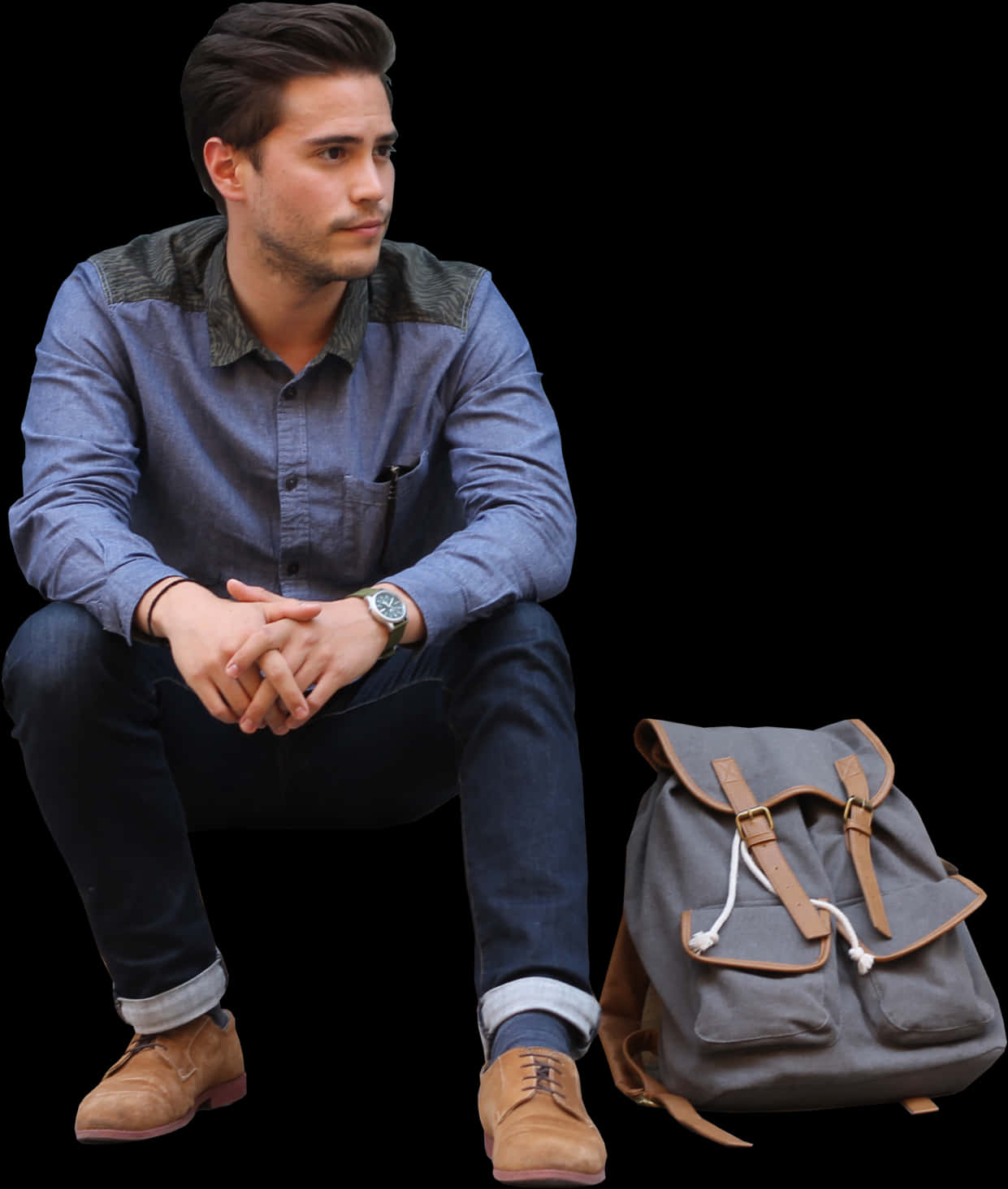 Man Sitting With Backpack