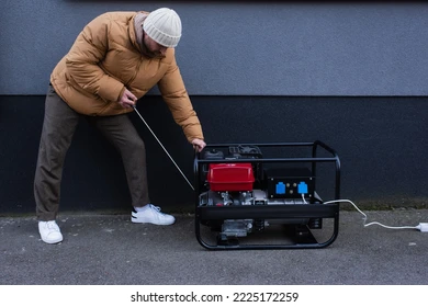 Man Starting Portable Generator Outdoors PNG with transparent background