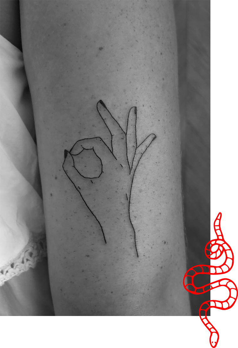 Minimalist O K Hand Gesture Tattoo