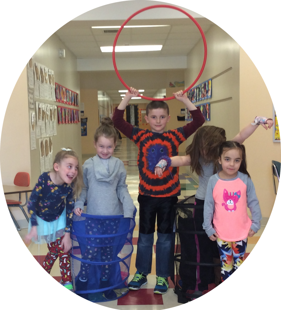 Playful Toddlerswith Hula Hoopand Laundry Baskets