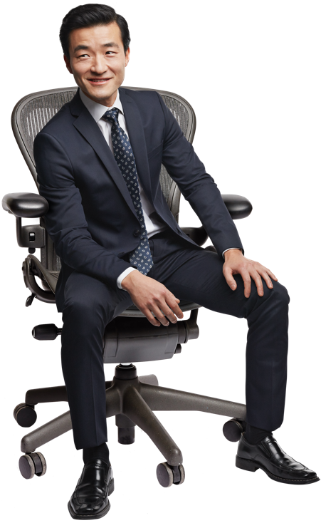 Professional Man Sittingin Office Chair.png