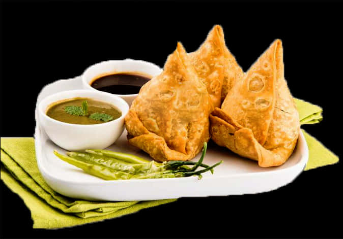 Samosaswith Chutneyand Green Chilies