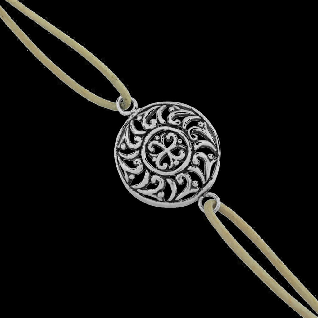 Silver Rakhi Designon Black Background