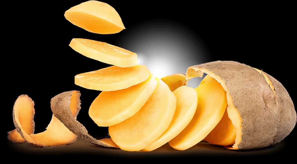 Sliced Potato Floating Against Black Background PNG with transparent background