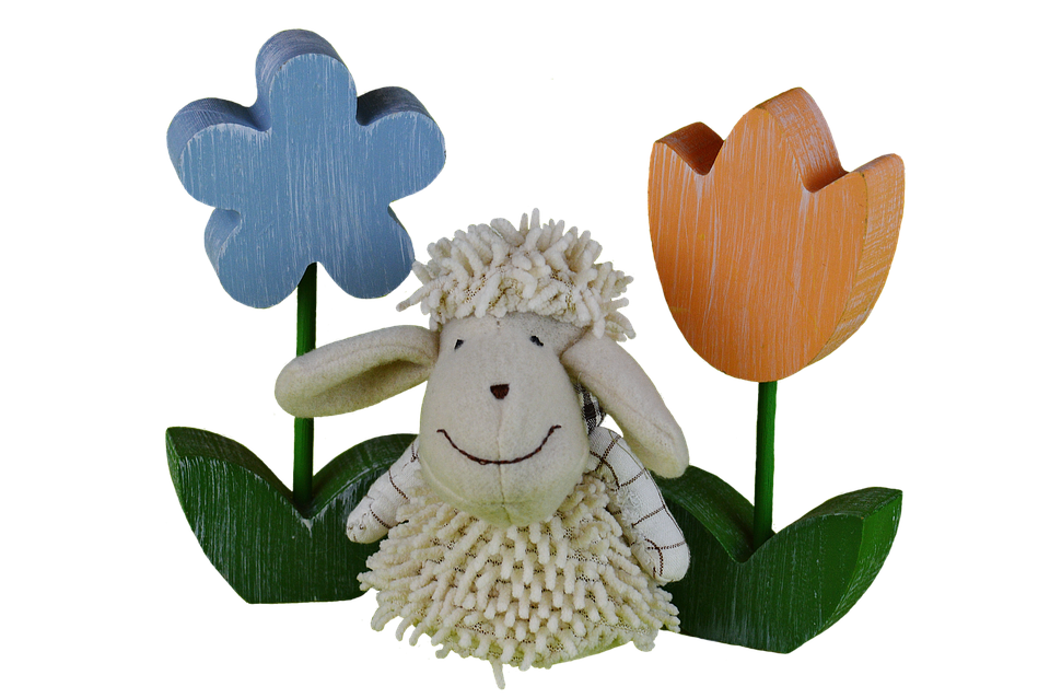 Smiling Sheep Between Wooden Flowers