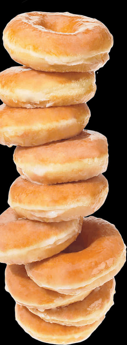 Stacked Glazed Donuts Black Background