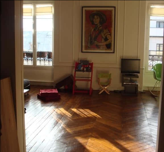 Sunny Living Roomwith Wood Flooring