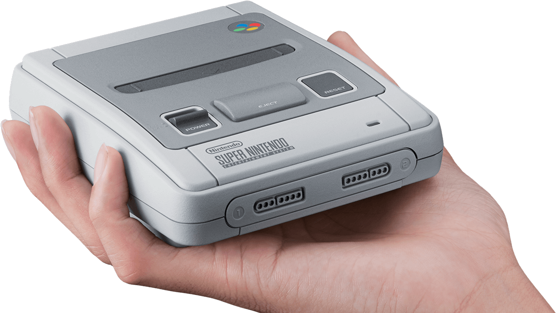 Super Nintendo Consolein Hand