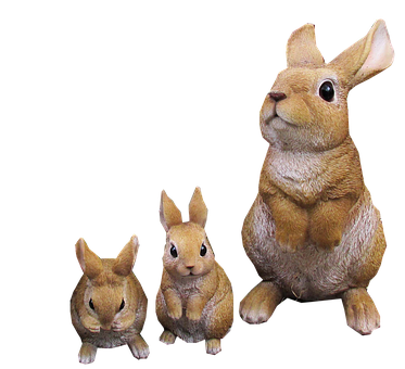 Three Rabbit Figurines Black Background PNG with transparent background