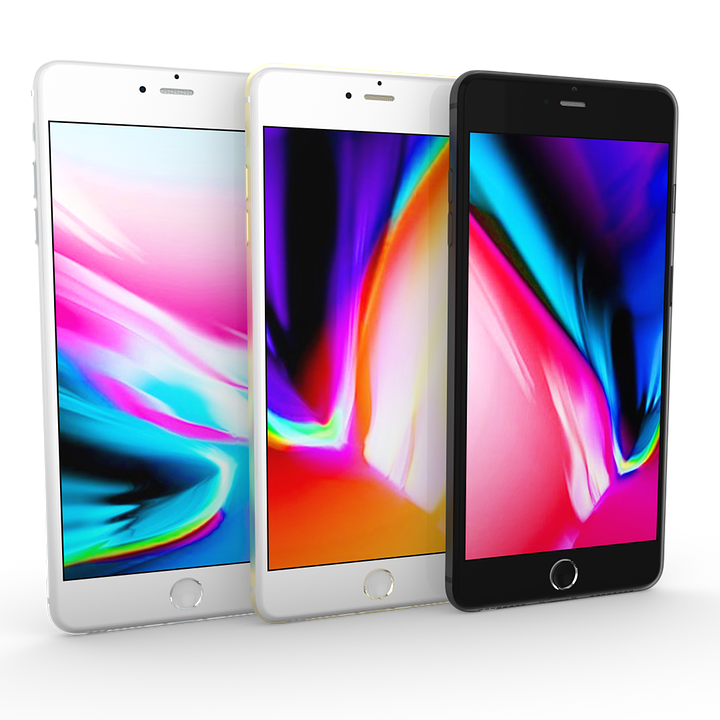 Threei Phone Models Displaying Colorful Wallpapers PNG with transparent background
