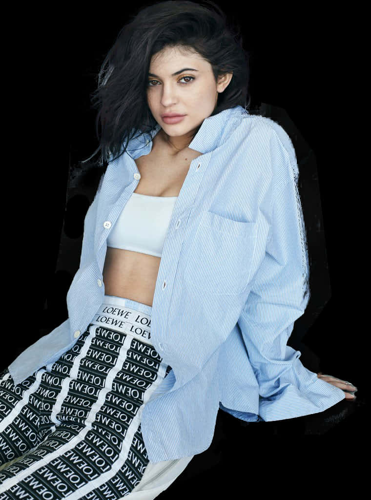 Womanin Blue Shirtand Printed Pants PNG with transparent background