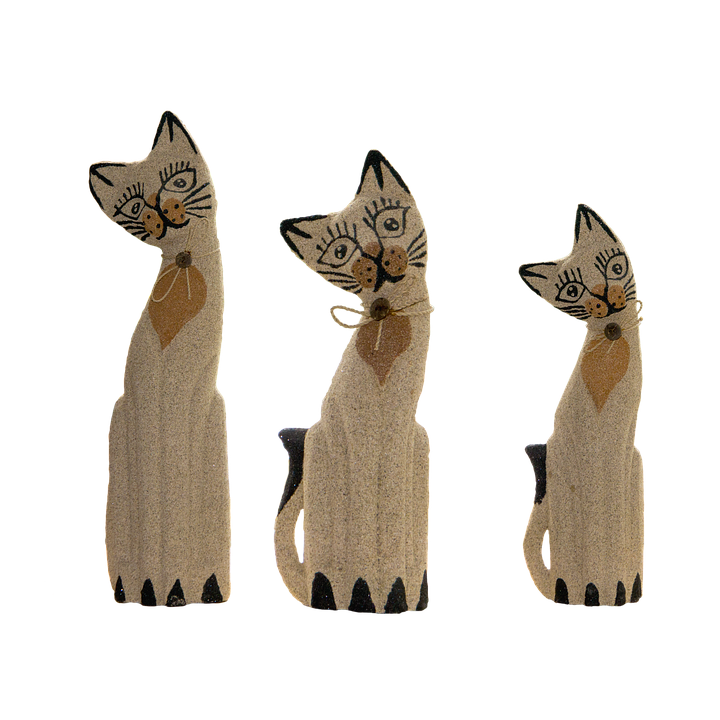 Wooden Cat Figurines Trio.png