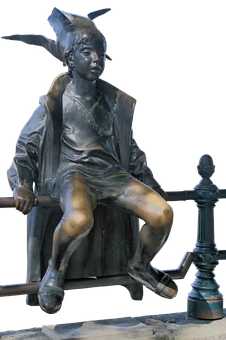 Bronze Statueof Seated Boywith Hat PNG Image