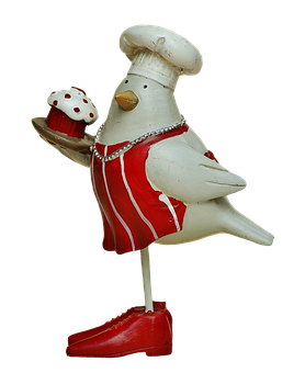 Chef Bird Figurinewith Cupcake PNG Image