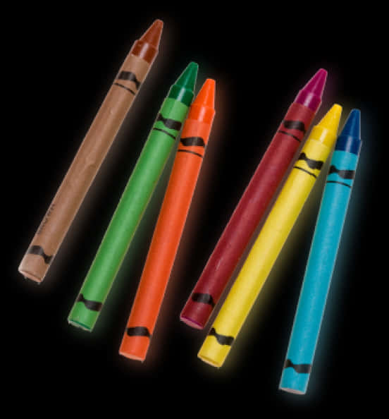 Colorful Crayons Arrangedon Black Background PNG Image