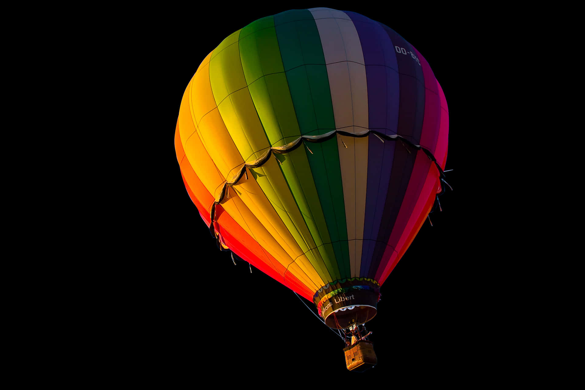 Colorful Hot Air Balloon Against Dark Background PNG Image