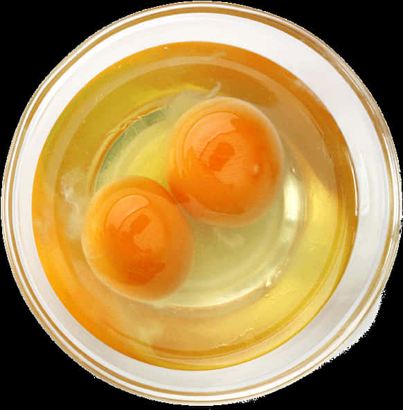 Double Yolk Eggsin Bowl PNG Image