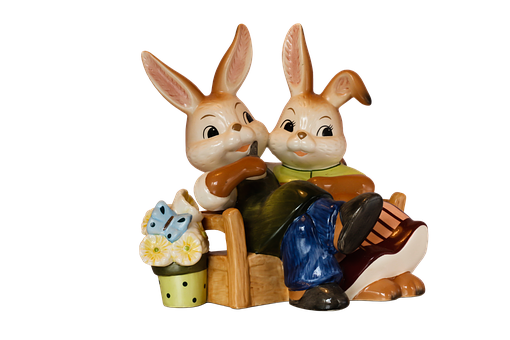 Easter Bunny Figurines Black Background PNG Image