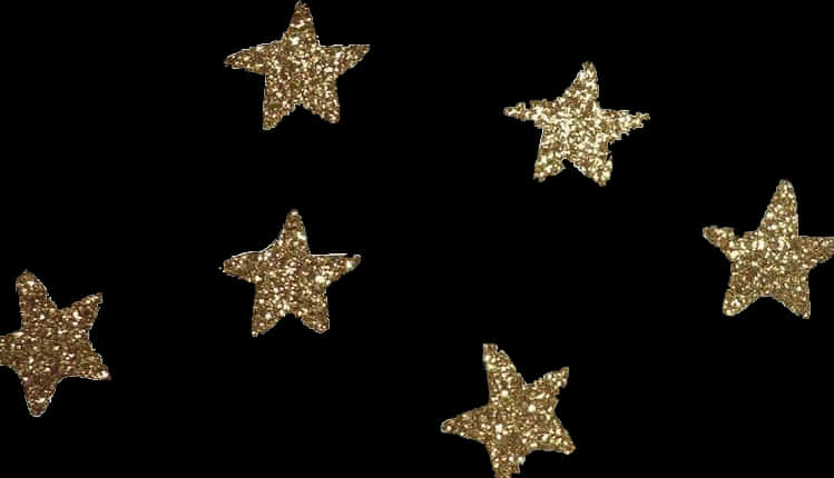 Glittering Gold Starson Black Background.jpg PNG Image