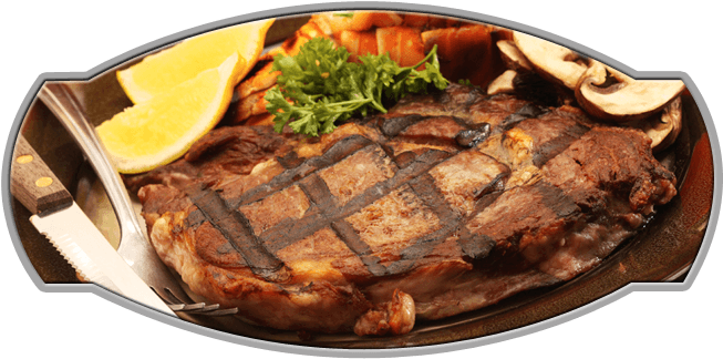 Grilled Steakwith Vegetablesand Citrus Garnish PNG Image