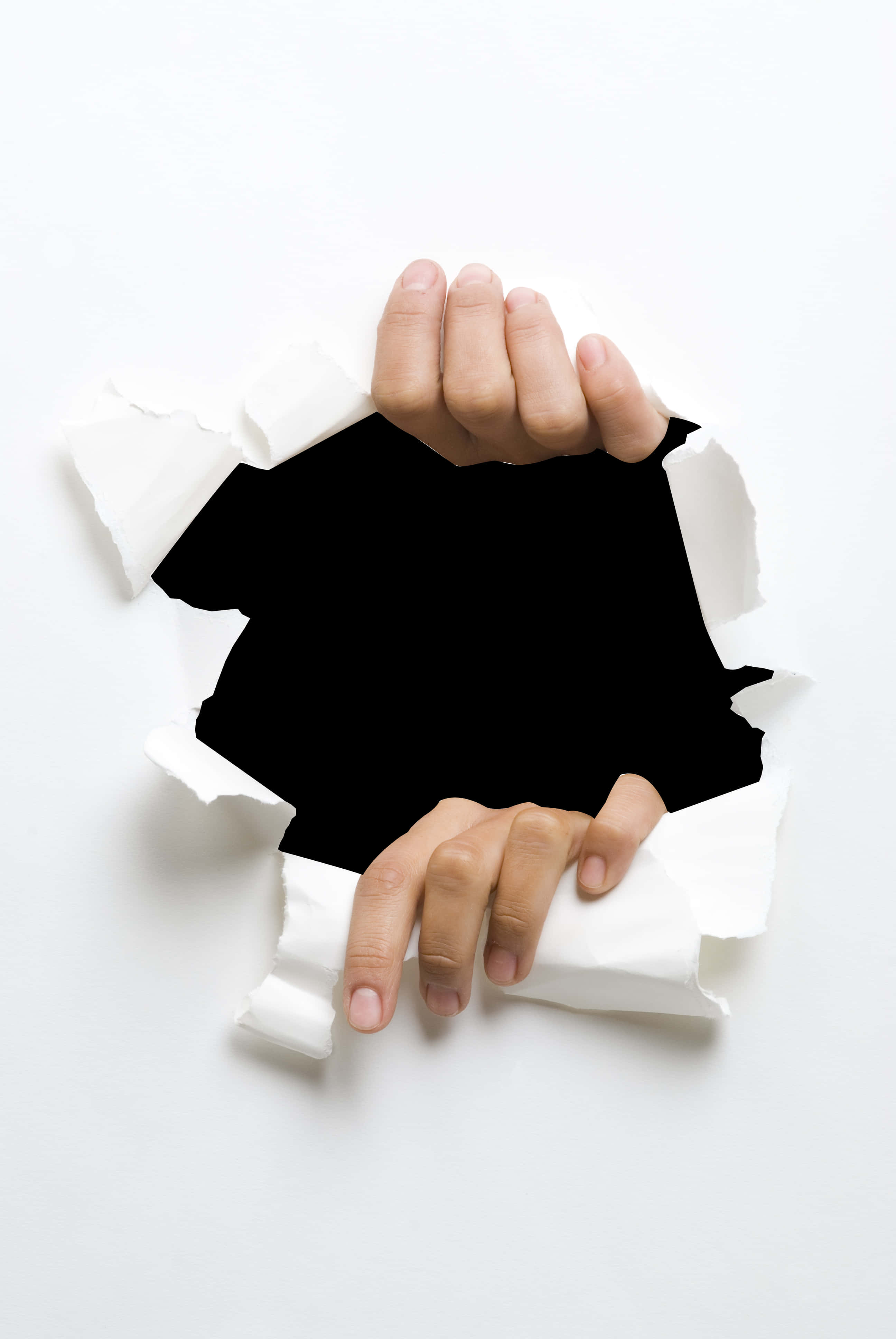 Hand Tearing Through Paper PNG Image