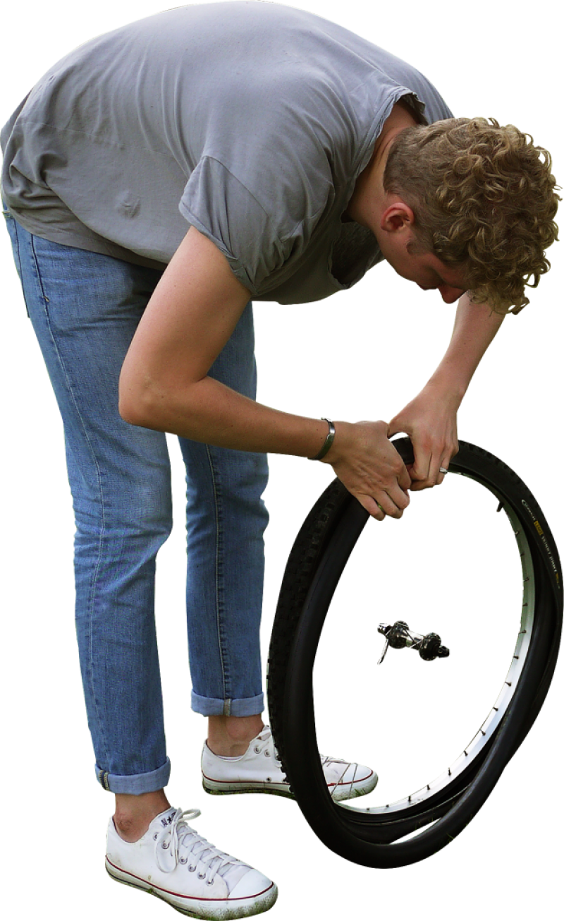 Man Repairing Bicycle Tire PNG Image