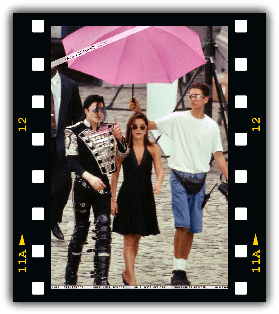 Michael Jackson Candid Walkwith Friends PNG Image