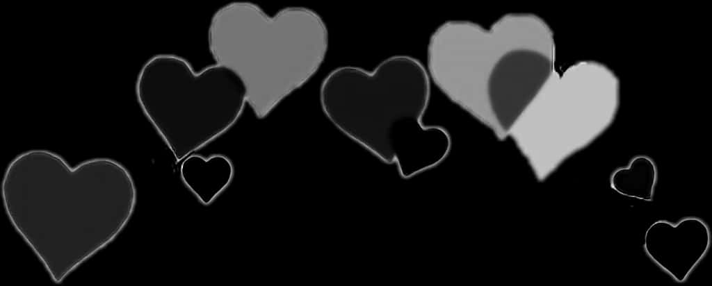 Monochrome Hearts Against Black Background PNG Image