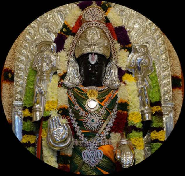 Ornate_ Hindu_ Deity_ Idol_ Decorated_with_ Flowers_and_ Jewelry PNG Image