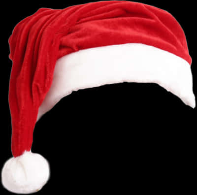 Red Santa Hat Isolatedon Black Background PNG Image