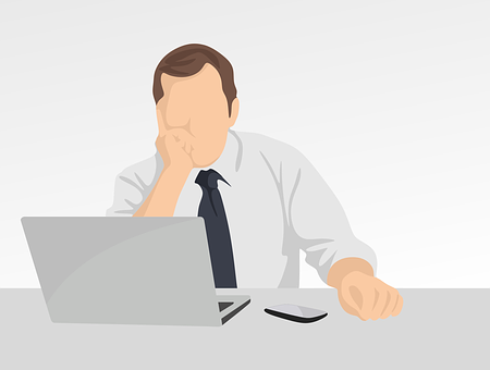 Stressed Businessmanat Desk PNG Image