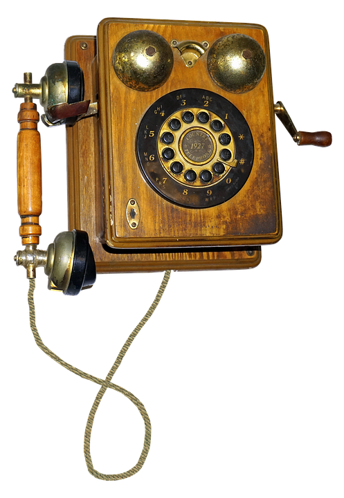 Vintage Wall Mounted Rotary Telephone PNG Image