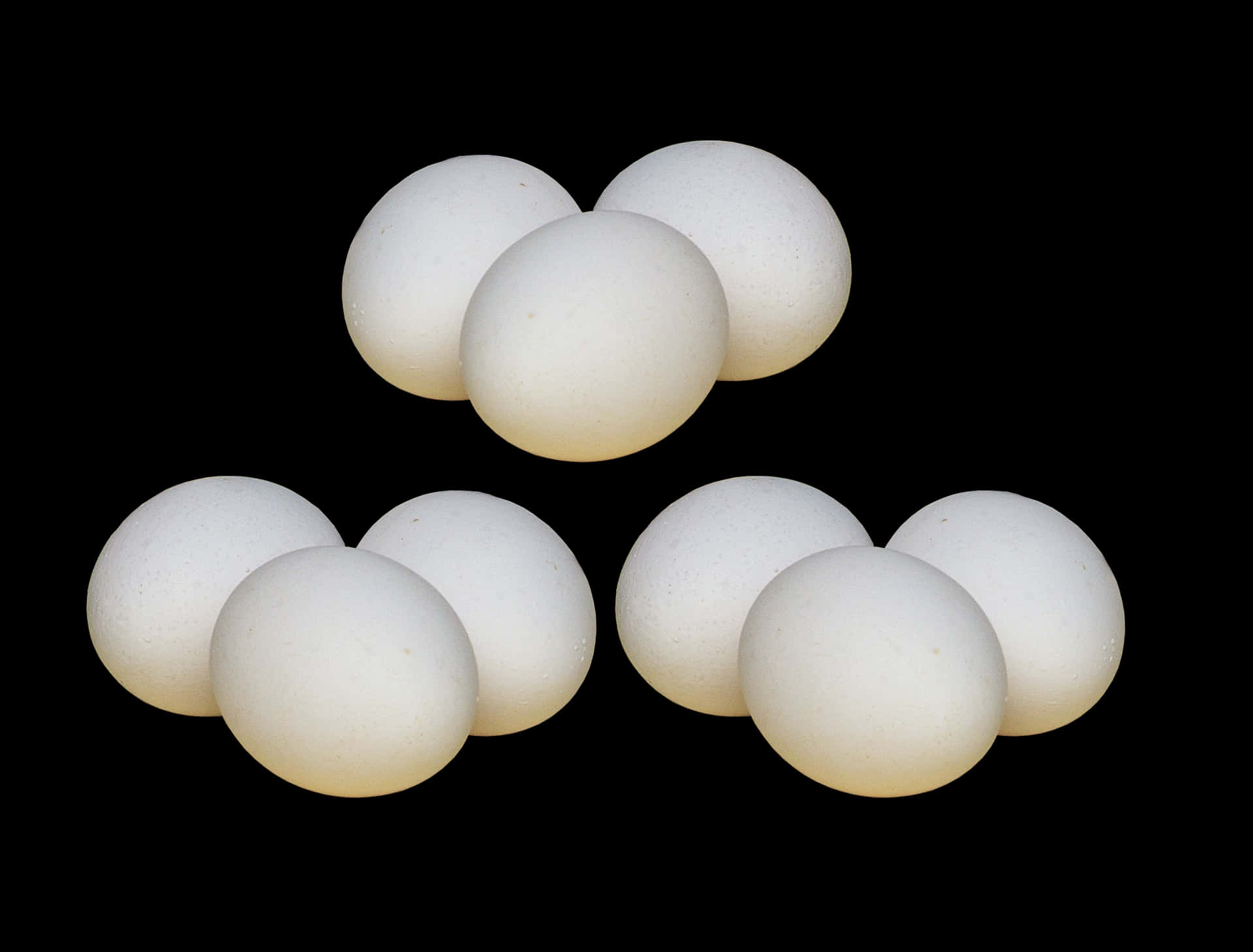 White Eggs Against Black Background PNG Image